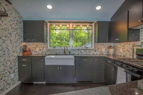 Kitchen is roomy and has wonderful view of front gardens