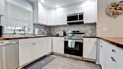 Our fully equipped kitchen is the perfect size to cook a homemade meal.