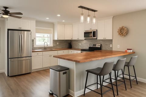 While you make dinner, have a pleasant company sit by your side.