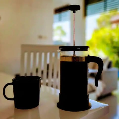 French press in the morning next to the pool. Peaceful and quiet.