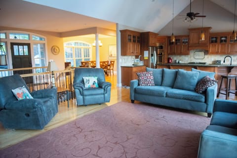 Living room with big screen TV.