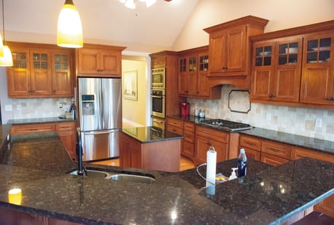 Fully stocked gourmet chef's kitchen.