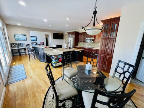 fully-stocked kitchen, games, and books.