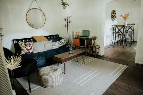 Living Room Retreat: Bright and airy space with stylish decor, perfect for relaxing or entertaining!