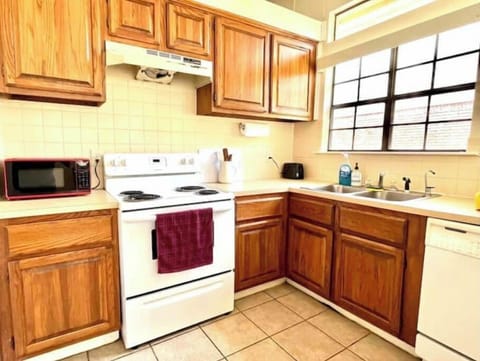 Functional kitchen with stove, oven, microwave, toaster, dishwasher, Keurig