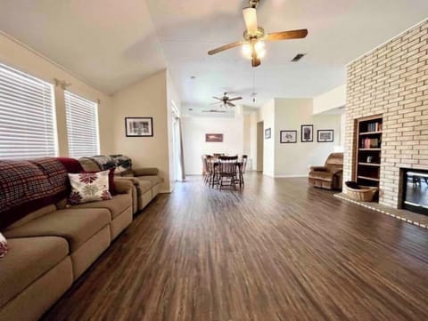 Spacious living room with fireplace and 50" tv