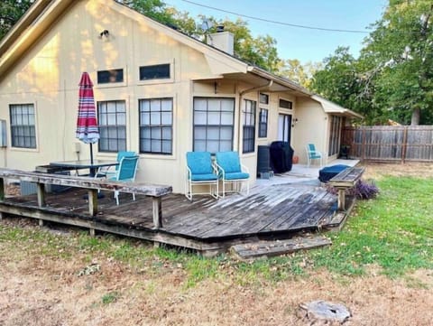 Large wraparound deck with lots of seating. Fenced, private yard.