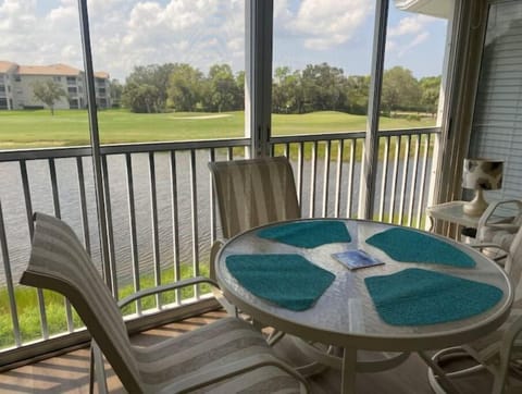 Rear Veranda View of of 3rd hole green and ponds
