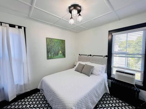 Bedroom 1 has a queen bed and closet space