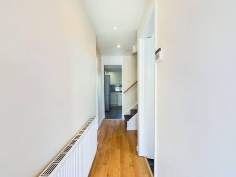 Corridoor- leading to living room and kitchen .