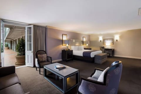 Step into your expansive suite and lounge after sightseeing.
