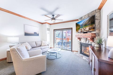 The living room is bathed in natural light, offering a generous and inviting space for relaxation.
