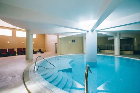 Swim year-round in a calm, heated indoor pool oasis.