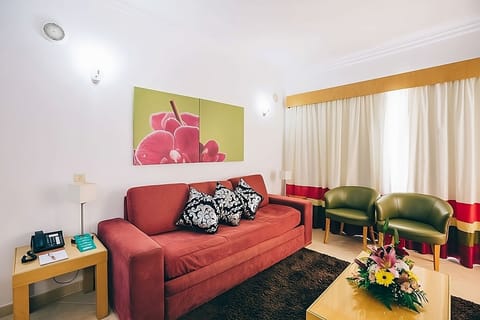 Unwind on the plush sofa after a day exploring.