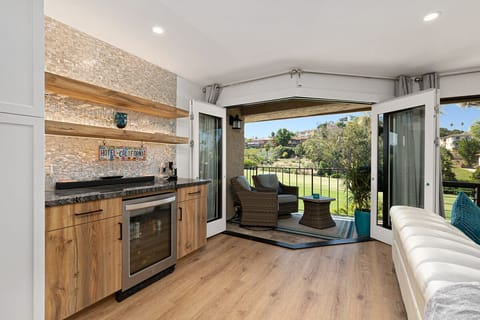 Fairway Haven Mini Bar and Patio - Unwind with a beverage and serene golf course outlook.