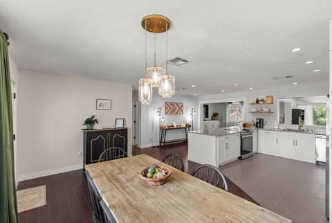 ✨ Modern Kitchen & Dining Area Bright, open-concept space with a sleek kitchen island