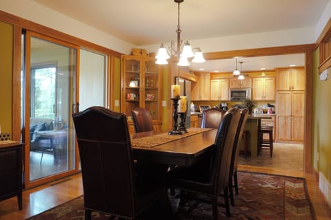 Dining table seats 6. Island seats 4.