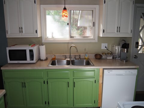 KITCHEN: The chalet has a full kitchen with all appliances including a dishwasher. It also has a good supply of cooking and dining utensils.