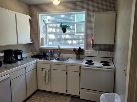 KITCHEN:  Recently updated kitchen with all appliances including a dishwasher and a good supply of cooking and dining utensils.