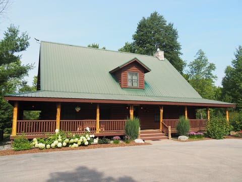 OVERVIEW:  The front of the cabin in summer.