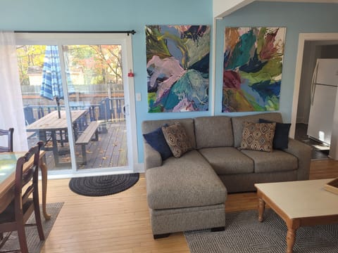 LIVING ROOM:  Another view of the cute living room, highlighting the sliding doors that go out to the back deck