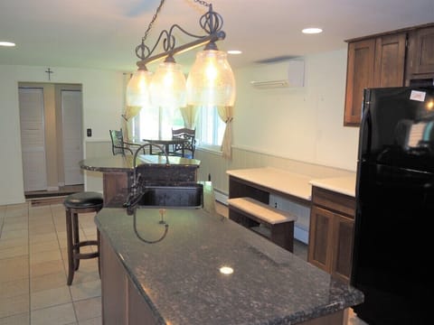 KITCHEN: Large kitchen with all appliances including a microwave and dishwasher.