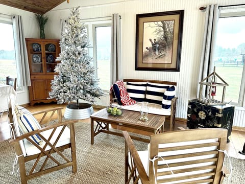 Take in the wintry landscape from the warmth of the sunroom.