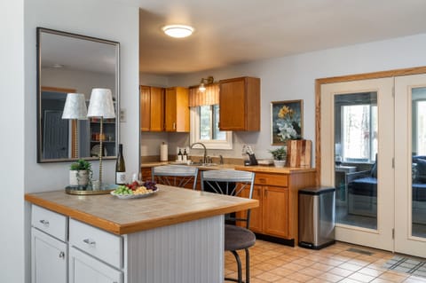 The kitchen is equipped with a dishwasher, new toaster oven, blender, crock pot, and new hybrid coffee pot which brews just one cup of coffee using your favorite Keurig flavor or a full pot for the group.