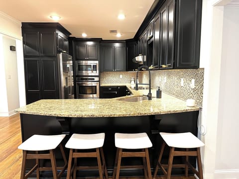 Kitchen with bar seating