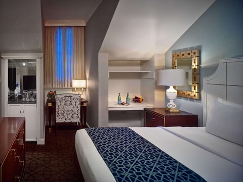 Unwind in a serene room with handy work nook.