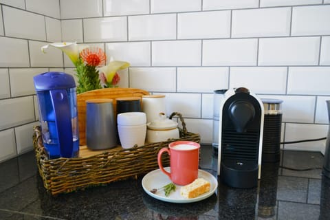 Enjoy decadent cappucinos with our Nespresso machine. Tea and coffee provided.