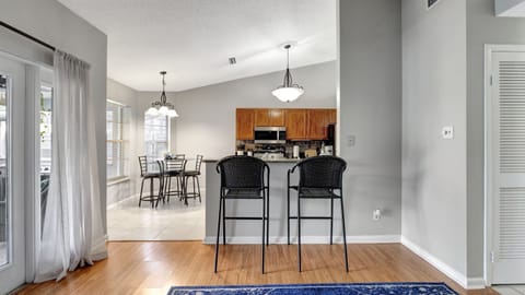 Savor the synergy of design and practicality as you dine in sophisticated comfort.