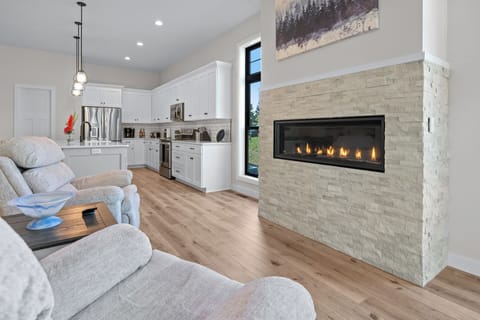Gas Fireplace overlooks the kitchen