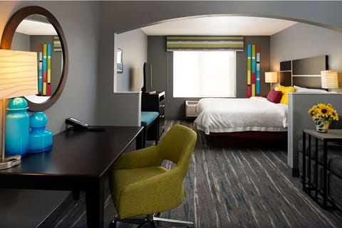 Settle in with a stylish workspace and relaxing lounge nook.