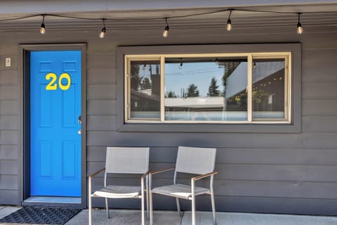 Front door exterior with patio chairs