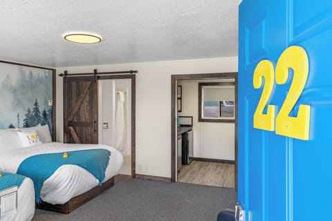 Main room with two double beds, view of