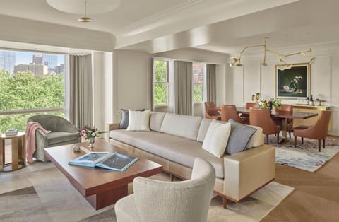 Gather comfortably in a grand living room and dining suite.