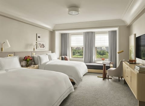 Stretch out in airy comfort with a calming park-view backdrop.