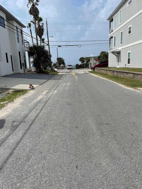 View from parking spots looking at beach access less than a block away