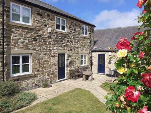 Chaff House - front entrance with pretty gardens