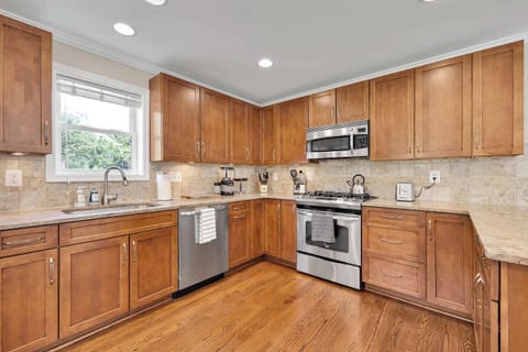 Socialize while you cook in the open and well equipped kitchen.