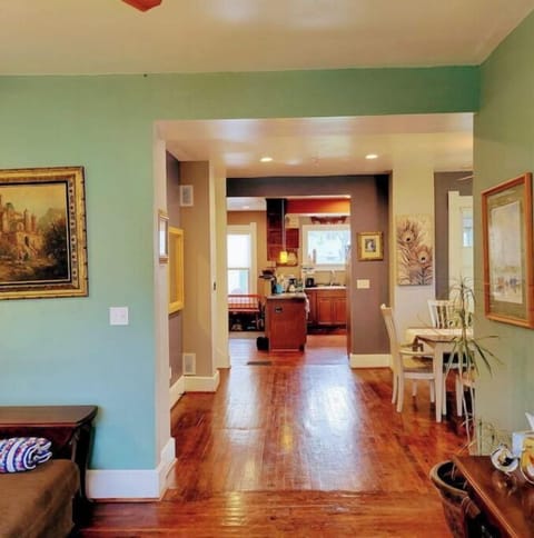 view from spacious living room open concept to the kitchen