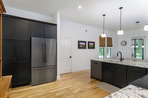 Kitchen with a dishwasher, coffee grinder & 2 types of coffeemakers (French Press & Standard Drip).
