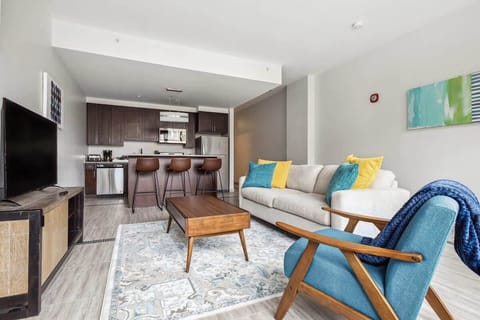 Blue accents and a beige sofa