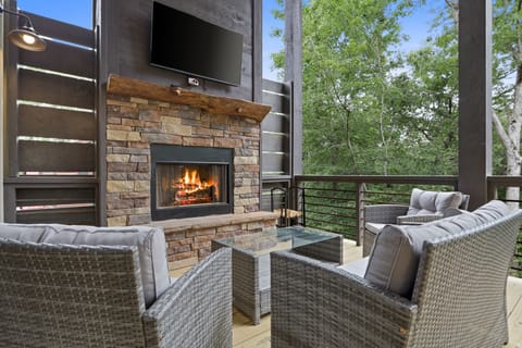 Chill out and catch a movie by the outdoor fireplace.