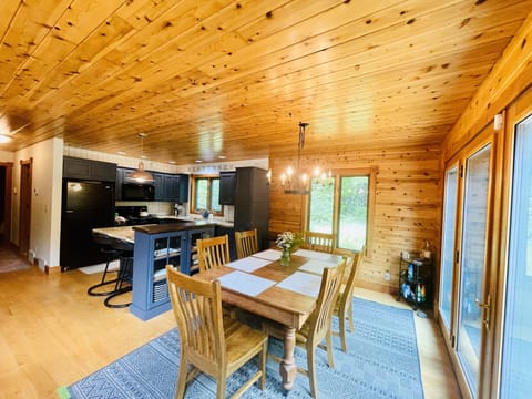 The open concept kitchen is loaded with amenities to make your vacation meal prep a breeze.