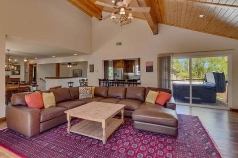 Living room with Hot Tub on Deck