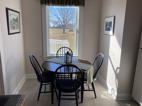 Enjoy the view of the farm across the road from the kitchen table.