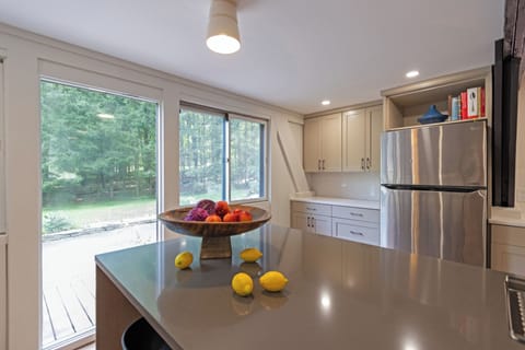 Fully stocked kitchen with lots of counter space and prep areas.