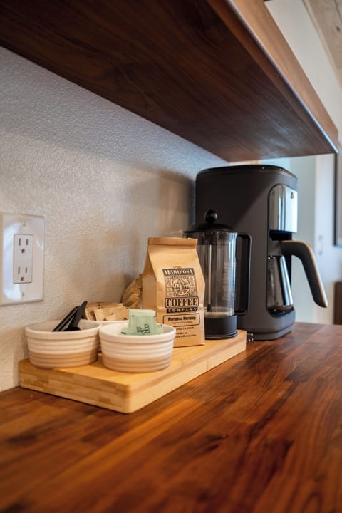 The beautiful open kitchen and dining space is fully equipped (less the food).